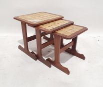 Mid century G-Plan nest of three teak and tile-top coffee tables