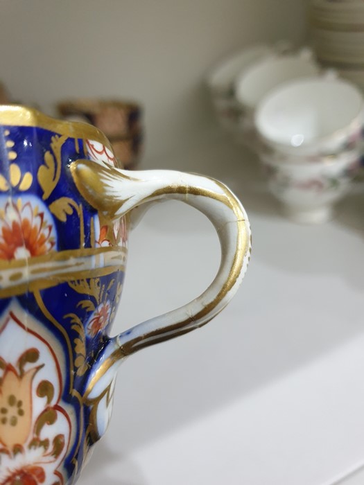 English porcelain Imari pattern part tea service of fluted form, 1820's, printed and painted in gilt - Image 19 of 36