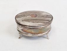 Early 20th century silver oval mounted trinket box, on cabriole supports, engraved decoration to lid