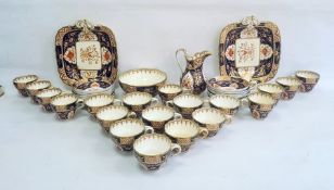 English porcelain Imari pattern part tea service of fluted form, 1820's, printed and painted in gilt