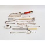 A 1920s silver fork, Birmingham 1928, a silver spoon, another and a quantity of plated flatware