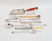 A 1920s silver fork, Birmingham 1928, a silver spoon, another and a quantity of plated flatware