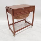 Mid century BR Gelsted Danish teak sewing trolley, the rectangular top above single drawer and