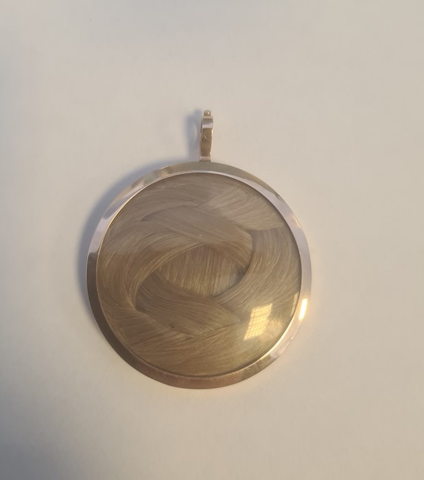 19th century gold-coloured memorial pendant of circular form with gilt metal initials surrounded - Image 2 of 2