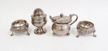Pair of Victorian silver circular salts, repousse decorated, Sheffield 1864, maker Henry Wilkinson &