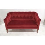 Early 20th century button-back sofa in red upholstery, on cabriole front legs  Condition