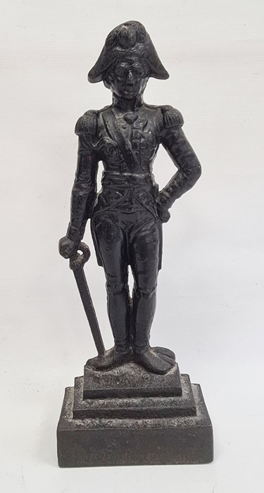 Cast iron model of a military figure on stepped base, 41cm high