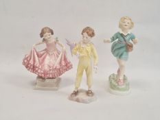Early Royal Doulton china figure of girl in pink tiered dress with green bows, possibly 1941, a