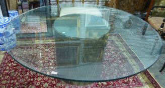 Modern centre table with central metallic cylindrical base and circular plate glass top, 153cm