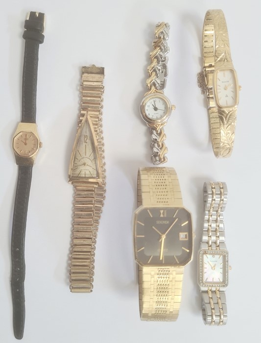 Lady's gilt metal Spritzer and Fuhrman bracelet watch, the dial of triangular form on rolled gold