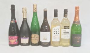 Three bottles of sparkling cocktails including Kir Royale, a 2016 Ferdinand Pieroth riesling and