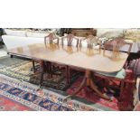 Regency style mahogany dining table with reeded edges, pedestal support, extended 211cm x 96cm wide