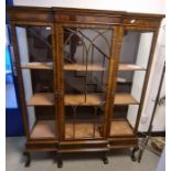 20th century mahogany breakfront display cabinet with ogee moulded cornice above central astragal-