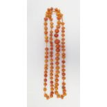 Single row of graduated butterscotch amber beads, largest bead approx 1.3cm x 1.1cm. 23.8g Condition