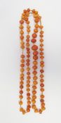 Single row of graduated butterscotch amber beads, largest bead approx 1.3cm x 1.1cm. 23.8g Condition