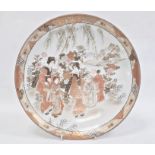 Japanese Kutani porcelain shallow dish, circular and decorated with figures beside a lake in iron