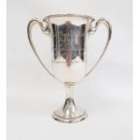An early 20th century sterling silver two-handled trophy cup, inscribed 'Lt. Col. George W. Gatchell