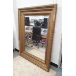 Possibly 20th century rectangular mirror with moulded gesso frame, rectangular bevel edged plate,