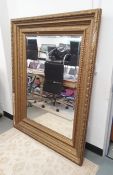 Possibly 20th century rectangular mirror with moulded gesso frame, rectangular bevel edged plate,