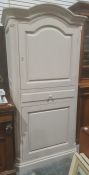 Grey painted French-style cabinet, the arch top above single cupboard door, single drawer and