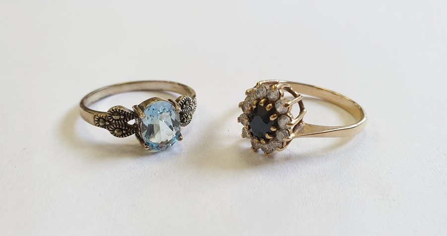 9ct gold, sapphire and white stone cluster ring and a silver, marcasite and blue stone ring (2)