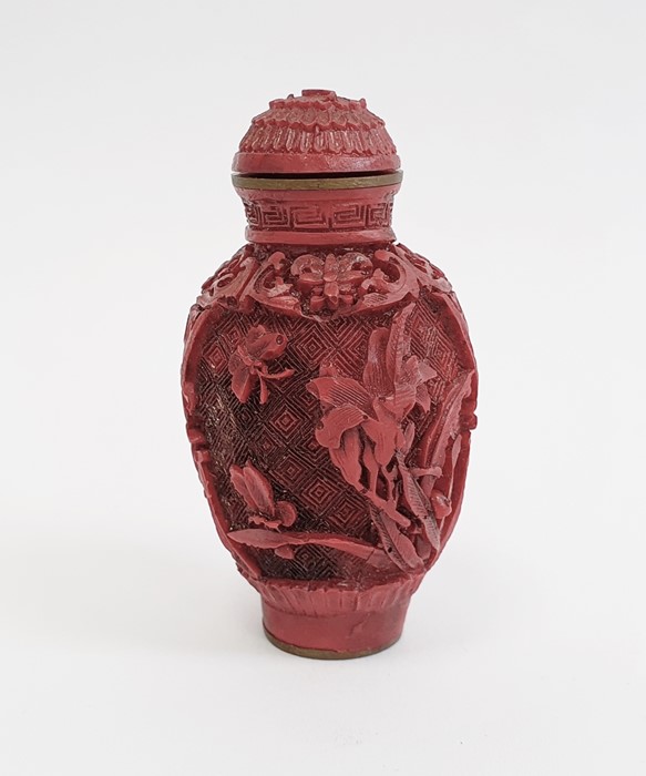 Chinese carved cinnabar lacquer snuff bottle, slender ovoid with panels of flowers, 6.5cm high, - Image 3 of 3