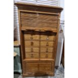 Early 20th century tambour-fronted filing cabinet, the moulded cornice above the tambour front,