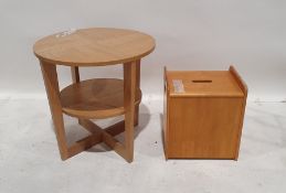 20th century oak-finish circular two-tier coffee table on X-shaped base, 60cm diameter and a linen