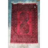 Modern Eastern-style rug, red ground, black decoration, 122cm x 80cm