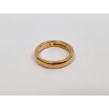 22ct gold wedding ring, engraved 'Usque ad finem' and dated to interior, finger size L1/2, approx.