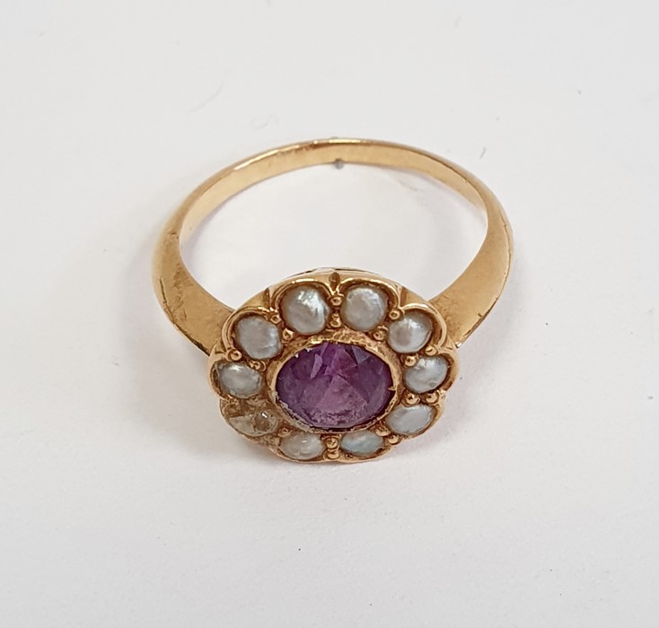 Late 19th/early 20th century gold-coloured cluster ring, the central circular mixed cut purple stone - Image 2 of 3