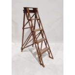 Antique set of folding ladders with four steps