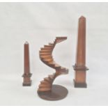 Architectural wooden model of spiral staircase, 36.5cm high and two various wooden obelisksCondition