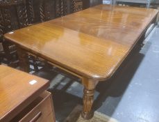 Large mahogany William & Mary-style extending dining table, the rectangular top with rounded