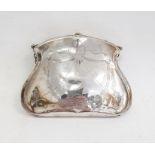 George V silver-mounted purse with brown leather interior, engraved detail of bow and swags, Chester