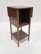 Small drop-leaf table with two shelves under, on square section supports, spade feet