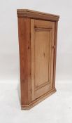 Early 20th century pine wall-hanging single door corner cupboard, 100cm high