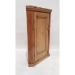 Early 20th century pine wall-hanging single door corner cupboard, 100cm high