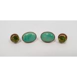Pair of 9ct gold stud earrings, each set with circular mixed cut peridots, approx 6mm diameter,