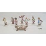 Continental porcelain monkey band in the Meissen manner, viz:- seven monkeys, some with damage and