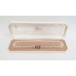 Lotus simulated pearl necklace, two rows of simulated pearls with white metal clasp, fitted box
