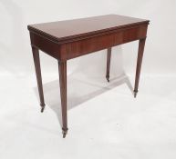 Late 19th century mahogany tea table with rectangular top with moulded edge and moulded tapering