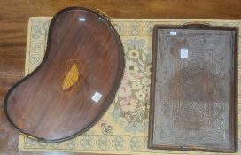 Kidney shaped mahogany tray with shell decoration, galleried border and brass coloured handles