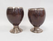 Pair of late 18th/early 19th century Scottish silver-mounted coconut cups, silver-mounted rim on