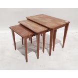 Nest of three mid-century teak Gordon Russell coffee tables on tapering supports
