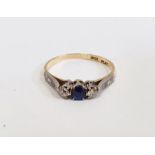 18ct gold, sapphire and diamond ring, stones platinum set, single facet-cut sapphire flanked by pair