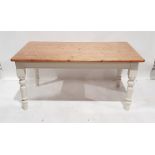 20th century pine-topped kitchen table, the rectangular top with rounded corners, on white painted