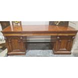 19th century mahogany pedestal sideboard the rectangular top with three drawers, on pedestal