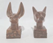 An Egyptian resin model head of a cat and a dog (2) 10cm and 11.5cm high approx.