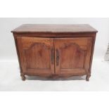 19th century French fruitwood buffet, the rectangular top with rounded front corners, moulded